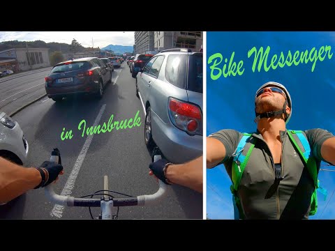 Bike Messenger, working on the Streets of Innsbruck, Austria - 4K