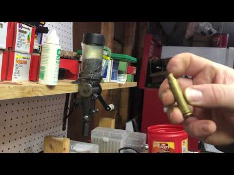 Charging a 223 Rem case with a Lyman #55 powder throw