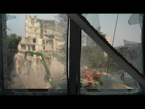 Video Thumbnail: Survivors retrieve belongings from homes after Russian strike
