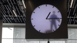 The Man in the Clock Schiphol Airport Amsterdam