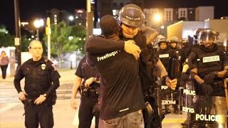 Man Faces Backlash For Hugging Officers In Riot Gear During Charlotte Protests