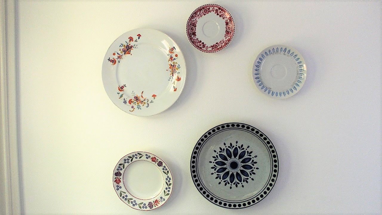 Hergebruik borden als muurdecoratie