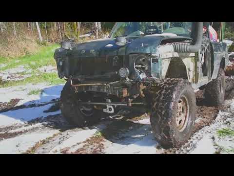 Our Land Rover Discovery Newt climbing the Log Bridge