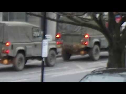 Double Convoy of Army Land Rovers
