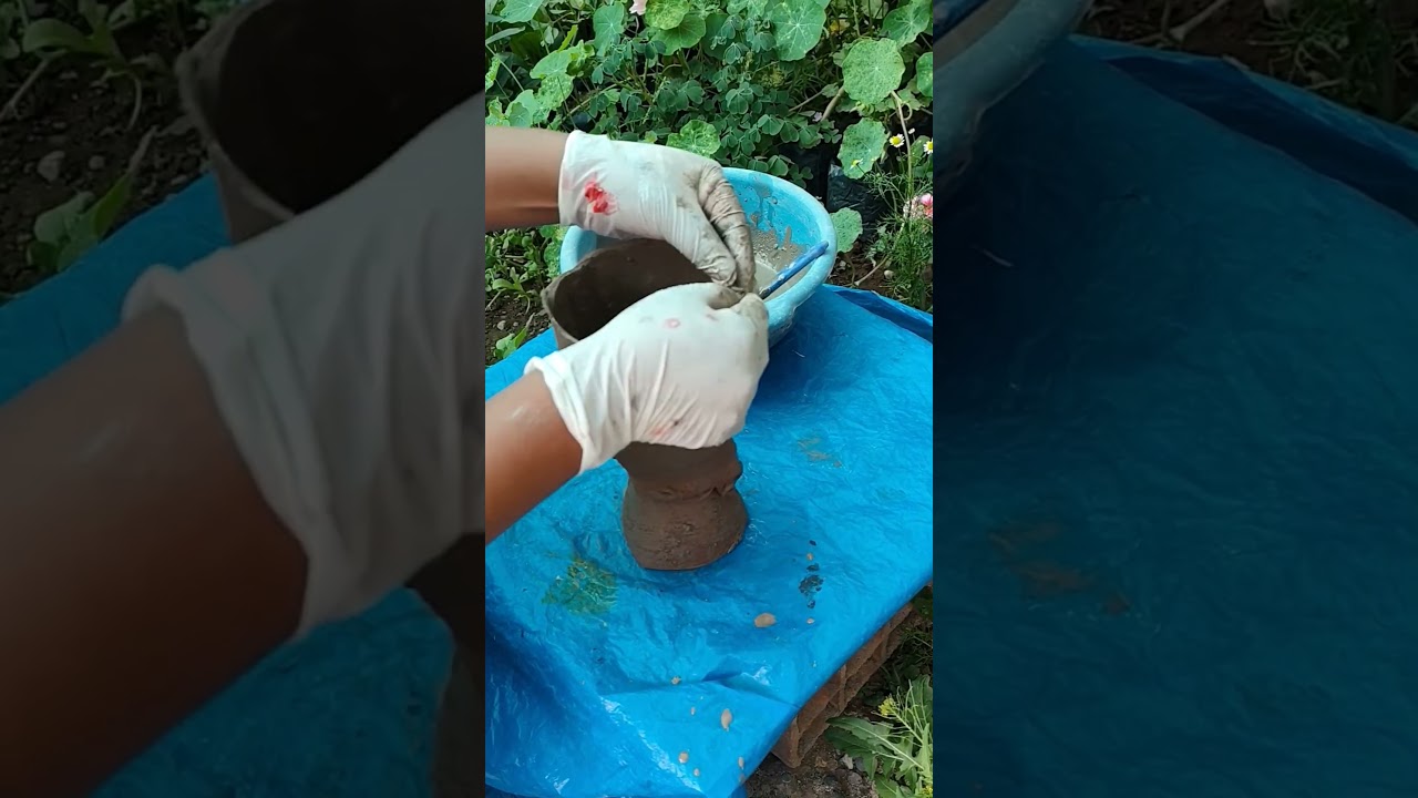 empezamos a poner tela con cemento en la botella