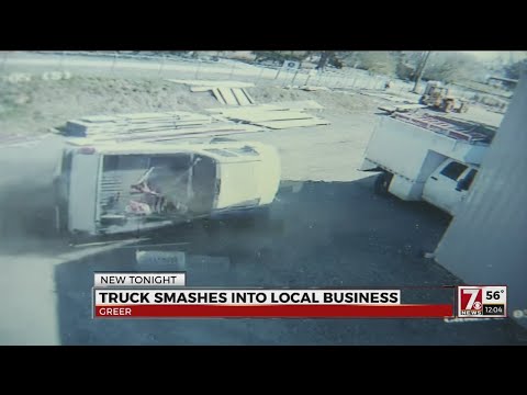 Surveillance video captures truck smashing into storage business in Greenville Co.