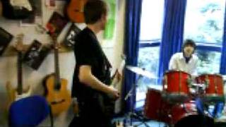 The only thing this little piece of badassery is lacking is footage of all their instruments burning while they play, because, like, shouldn't they be worried about the FIRE?! (Via.)