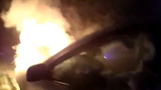Watch Dramatic Rescue Of Officer Saving Woman From Burning Car