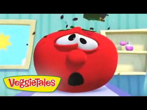 Red veggie character from VeggieTales with a shocked expression and wide eyes in a colorful kitchen set.