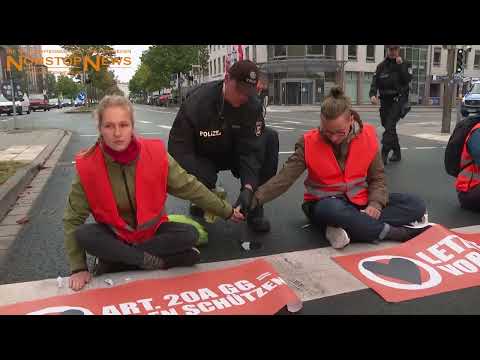 31.08.23 Video: Klima-Kleber legen mit Protestaktion Berufsverkehr in Rostock lahm - Polizeieinsatz