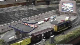 preview picture of video 'Huge O-scale 22'x51' Model Railroad Layout with Americana theme'