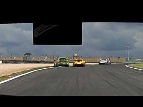 Donington Park 25/04/22 - Radical pushes VW Scirocco off circuit - near accident.