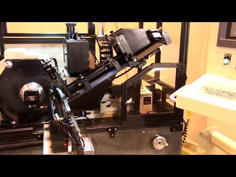 Royal Master TG-12x4 Centerless Grinder with 7 Axis CNC Control Grinding a Diesel Injector Nozzle