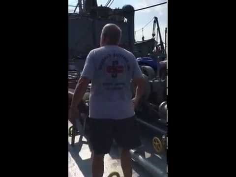 Lowering a boom on the SS JOHNWBROWN