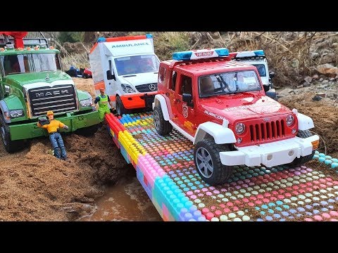 Bruder toys / Build Bridge Blocks - Toy police car, ambulance, dump truck, crane