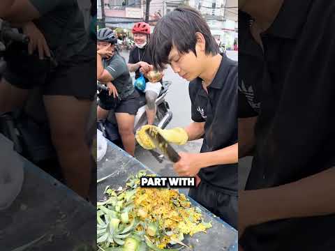 He peels pineapples like a legend! 🍍🔥