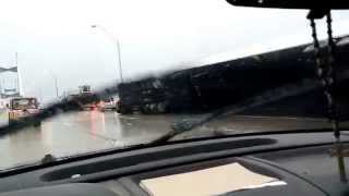 Two Tractor Trailers overturned on Dames Point Bridge by Storm Front&#39;s Winds barreling through