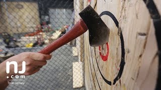 Competitive ax throwing Test your chops here (while someone holds your beer)