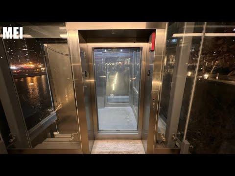Glass MEI Hydraulic Elevator at Wolf Point in Chicago, IL