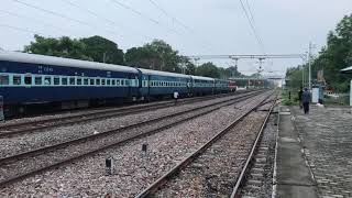 preview picture of video 'Goods train passing by at Bamrauli Railway Station in Allahabad, Uttar Pradesh, India.'