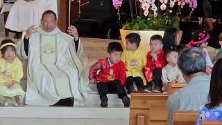 St. Thomas More Catholic Church Vietnamese Choir 01-28-24 Lunar Mass. Bishop Pham with Childrens.