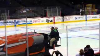 Man falls asleep while riding the zamboni