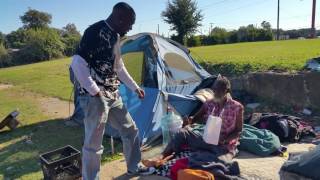 LJ Echols down town Dallas, TX feeding and praying for the homeless