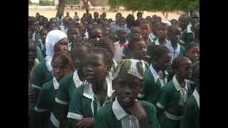 Gambian children sing the National Anthem
