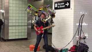 &quot;ONLY IN NEW YORK&quot; - A &quot;ONE MAN BAND&quot; SUBWAY PERFORMER DOING HIS THING IN THE TIMES SQUARE STATION.