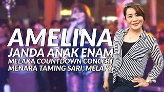 Amelina menyampaikan lagu Janda Anak Enam di Melaka Countdown Concert di Menara Taming Sari, Melaka