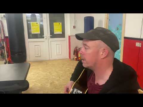 Mark Flynn with the Men's Shed Guitar Group