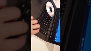 how to put a CD/DVD into a laptop