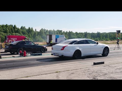 BMW E36 3.0T M54 HX40s vs 2012 Jaguar XJL 5.0 1/4 mile drag race