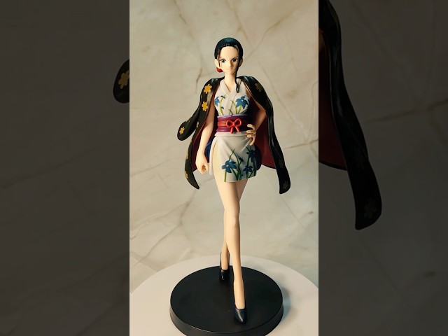 Vídeo relacionado con Banpresto Figura de Accion Nico Robin One Piece, The Shukko, Ver.Egghead 17cm, BP29641P Multicolor, Figura Coleccionable, Optimo para los fanaticos del Anime
