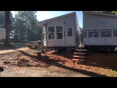 Double wide mobile home, setting and leveling