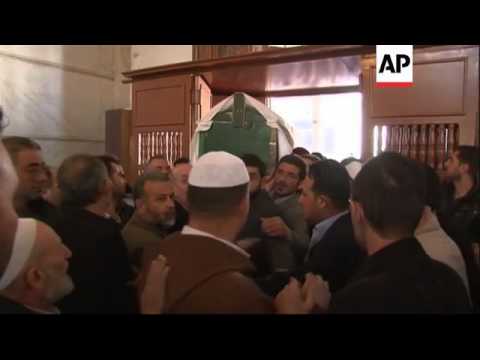 Funeral of slain preacher al-Buti after mosque bombing