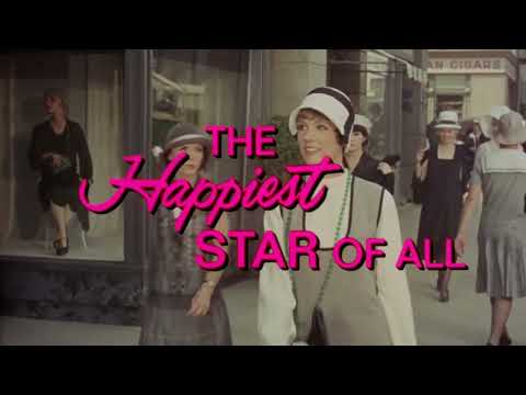 Trailer frame: Andrews and Fox in ballroom light, with orchestra hits underlining the comedy-romance
