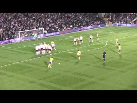 GOAL! Jermaine Pennant celebrates superb free kick v Fulham with travelling Wigan Athletic fans