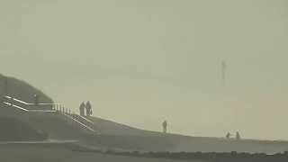 Rhyl Skytower in fog from Prestatyn Beach & Prom Denbighshire Wales UK