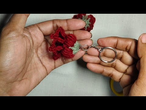 Easy keychain flower tutorial 🧶 #yarn#knitting#crochetpattern#viral#diy#crochet#fun#like#share#pop