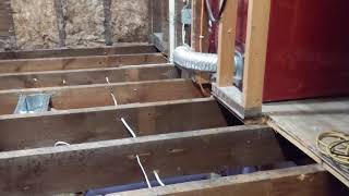 How to level floor joists in old home.