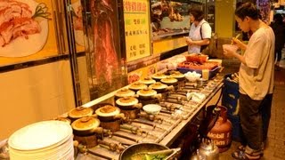 preview picture of video 'Hong Kong Street Food. The Preparation of Rice Hot Pot'