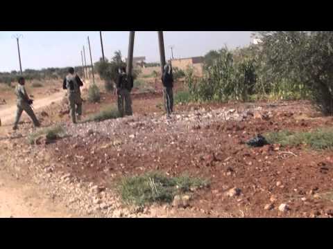 انتشار مقاتلي لواء أحباب الله داخل قرية كفرجوم وتمشيطها  من قوات النظام  بعد السيطرة عليها