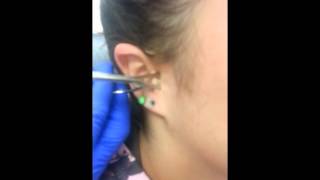 preview picture of video 'Tragus Piercing Video at Lexington Ink Tattoos & Body Piercing'