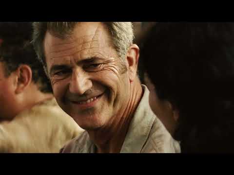 Get the Gringo official trailer frame with Mel Gibson behind bars in El Pueblito