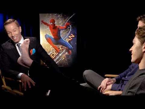 Tom Holland Shows Off His Spider-Man Tattoo EXCLUSIVE (Full Interview) thumnail