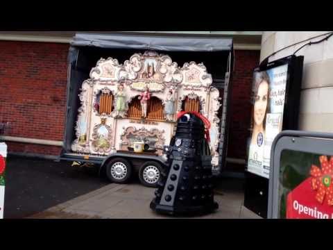 a Dalek dancing to Something Stupid played on a Dutch street organ.
