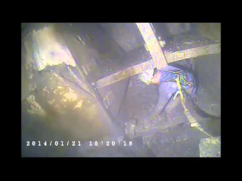 Crews work inside the SR 99 tunneling machine