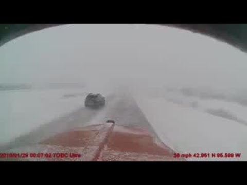 Watch: Truck narrowly avoiding multiple highway crash scene in snowstorm