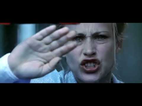 Official trailer frame: Patricia Arquette as Frankie Paige, blood-specked and backlit in crimson